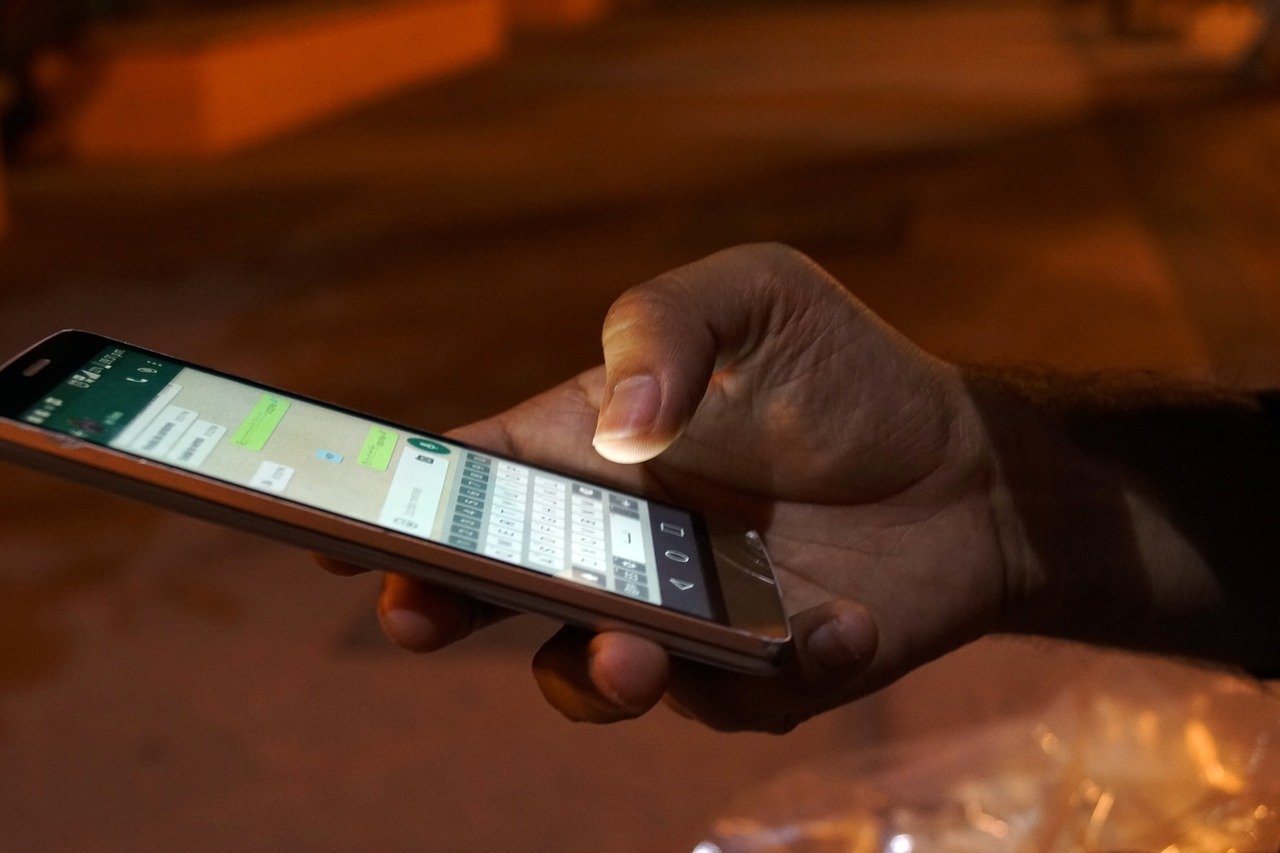 person holding smart phone
